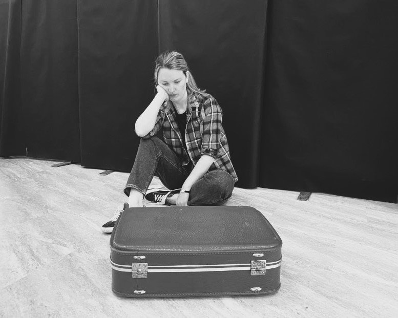 Alex Boese rehearsing 'Birthmarks' Photo is in black and white.