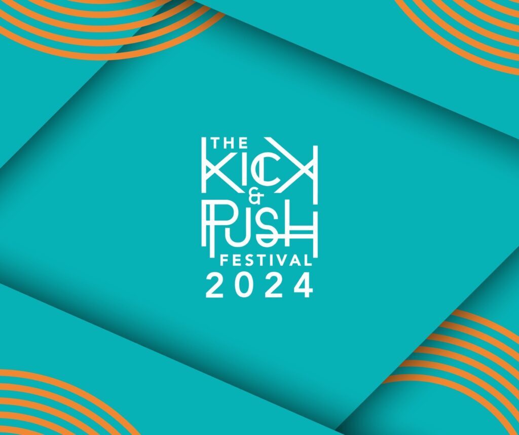 Graphic for the 2024 Kick & Push Festival. The image is blue with white writing of "The Kick & Push Festival 2024" in the centre and orange lines in each of the corners.