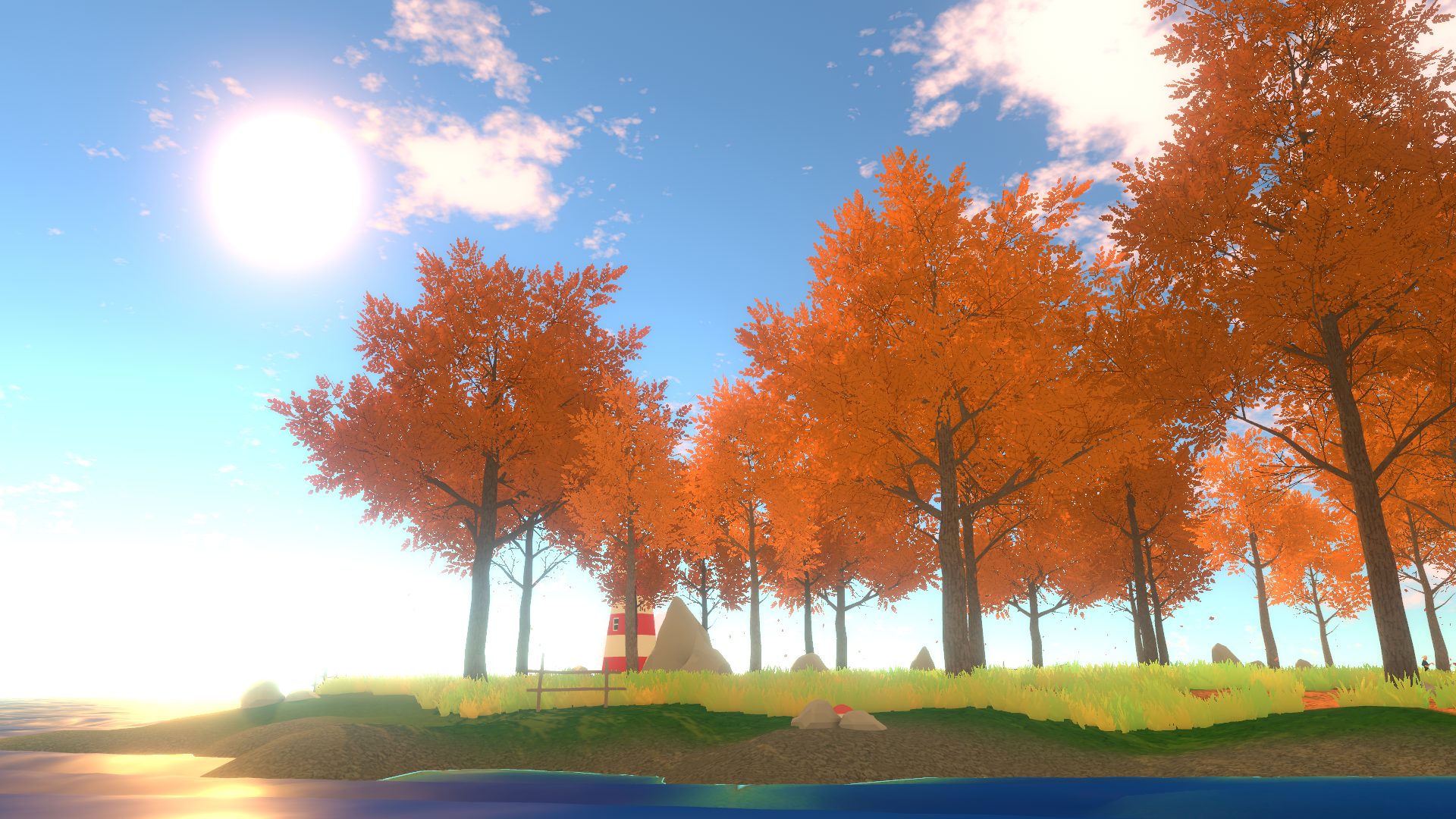 Image of a Virtual Reality world. There is a clear blue sky with very few clouds. Lovely green grass below the sky with large, full maple trees that have reddish-orange leaves.