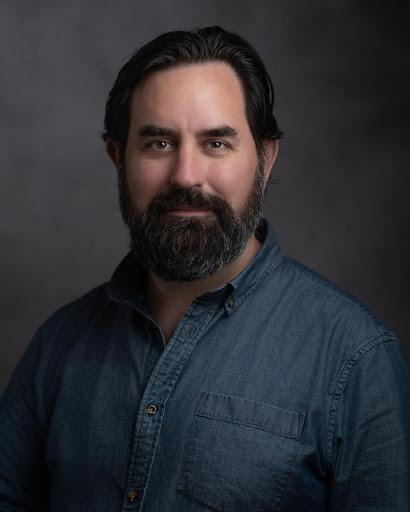 Headshot of Will O'Hare. 
