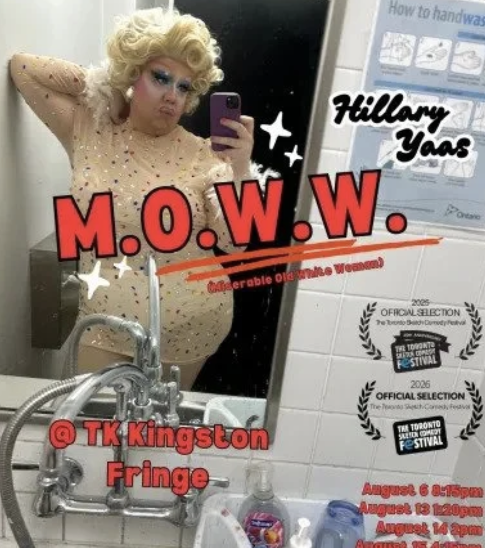 Hillary Yass taking an iPhone selfie in the mirror with the caption "M.O.W.W." written on the image in red text.